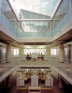 Three-story atria, including the one shown in this photo, carry light deep into the space. Credit: Hester + Hardaway
